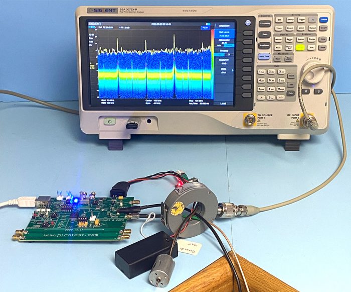 使用频谱分析仪和电流探头从演示板测量谐波电缆电流的照片
